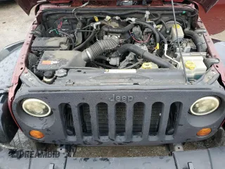 2007 Jeep Wrangler Unlimited Sahara z VIN 1J4GB59157L199454, wystawiony jako Copart lot #82314724 z przebiegiem Nie podano mil oraz Czysty tytuł • Clean title. Historia ofert i sprzedaży dostępna na DreamBid. Obrazek 11.