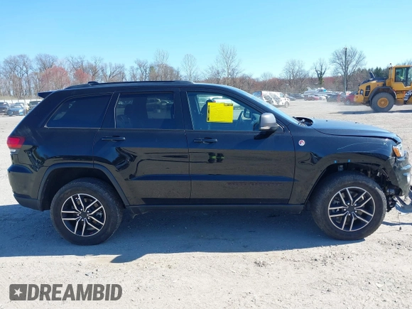 2021 Jeep Grand Cherokee Trailhawk with VIN 1C4RJFLGXMC698606, listed as a IAAI auction lot 41901479 with 50,086 mi miles. Bid and sale history available at carsss.com. Image 13.
