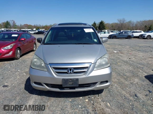 2007 Honda Odyssey EX-L with VIN 5FNRL387X7B080906, listed as a IAAI auction lot 41910061 with 229,717 mi miles and . Bid and sale history available at DreamBid. Image 12.