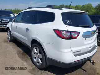 2016 Chevrolet Traverse LT with VIN 1GNKRGKD3GJ254269, listed as a IAAI auction lot 42006283 with 154,586 mi miles. Bid and sale history available at carsss.com. Image 3.