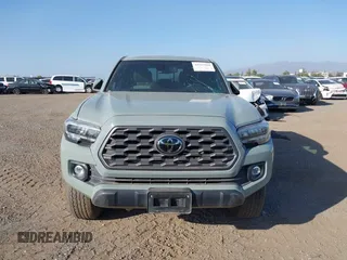 2022 Toyota Tacoma SR with VIN 3TMCZ5AN7NM501028, listed as a IAAI auction lot 42537868 with 42,186 mi miles and . Bid and sale history available at DreamBid. Image 12.