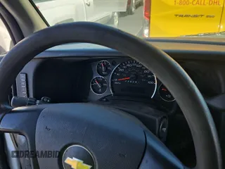 2012 Chevrolet Express Cargo z VIN 1GCWGFCA8C1179156, wystawiony jako IAAI lot #42619582 z przebiegiem 168 910 mil mil oraz . Historia ofert i sprzedaży dostępna na DreamBid. Obrazek 7.