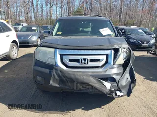 2011 Honda Pilot EX-L with VIN 5FNYF4H69BB015375, listed as a IAAI auction lot 41826235 with 199,171 mi miles and . Bid and sale history available at carsss.com. Image 12.