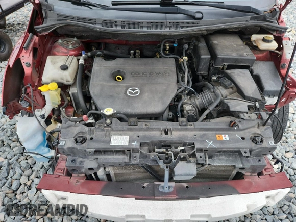 2012 Mazda 5 Touring z VIN JM1CW2CL3C0105567, wystawiony jako Copart lot #59343205 z przebiegiem 110 410 mil mil oraz Szkoda całkowita • Salvage title. Historia ofert i sprzedaży dostępna na DreamBid. Obrazek 12.