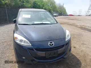 2014 Mazda 5 Grand Touring z VIN JM1CW2DL9E0171350, wystawiony jako IAAI lot #42113779 z przebiegiem 90 120 mil mil oraz . Historia ofert i sprzedaży dostępna na DreamBid. Obrazek 6.