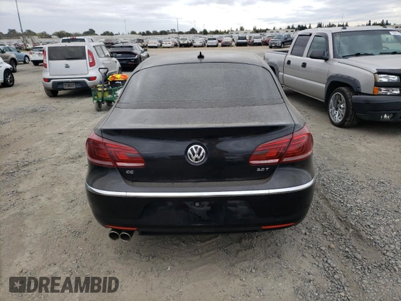 2013 Volkswagen CC R-Line with VIN WVWBP7AN5DE567272, listed as a Copart auction lot 76392474 with 98,450 mi miles and Salvage Title. Bid and sale history available at DreamBid. Image 6.