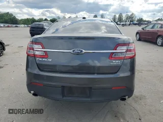 2018 Ford Taurus SEL with VIN 1FAHP2E8XJG137325, listed as a Copart auction lot 58850415 with 84,540 mi miles and Salvage title. Bid and sale history available at DreamBid. Image 6.