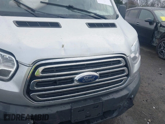 2017 Ford Transit with VIN 1FTBW2CM9HKB42073, listed as a IAAI auction lot 41187596 with 100,287 mi miles and . Bid and sale history available at DreamBid. Image 6.
