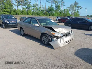 2002 Toyota Camry XLE z VIN 4T1BF32K92U034789, wystawiony jako IAAI lot #42142794 z przebiegiem 171 483 mil mil oraz . Historia ofert i sprzedaży dostępna na DreamBid. Obrazek 1.