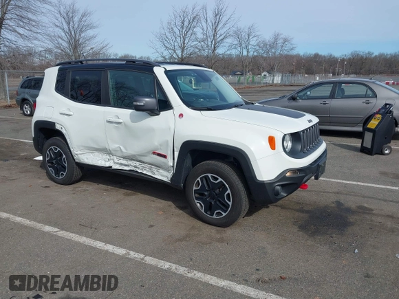 2015 Jeep Renegade Trailhawk with VIN ZACCJBCT6FPB32422, listed as a IAAI auction lot 41618410 with 42,219 mi miles and . Bid and sale history available at DreamBid. Image 1.
