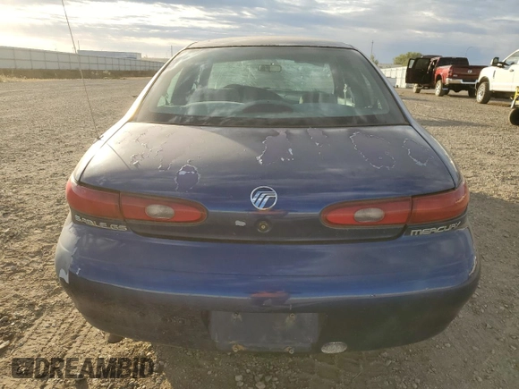 1996 Mercury Sable GS z VIN 1MELM50U3TA659219, wystawiony jako Copart lot #74373944 z przebiegiem 156 398 mil mil oraz Szkody całkowita. Historia ofert i sprzedaży dostępna na DreamBid. Obrazek 6.