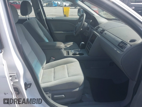 2005 Ford Five Hundred SE с VIN 1FAFP23155G180845, выставлен на аукционе IAAI как лот 42298793 с пробегом 204 197 миль миль и . История ставок и продаж доступна на DreamBid. Изображение 5.