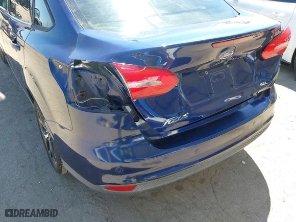 2017 Ford Focus SEL with VIN 1FADP3H21HL206514, listed as a IAAI auction lot 41864635 with 92,102 mi miles. Bid and sale history available at carsss.com. Image 6.