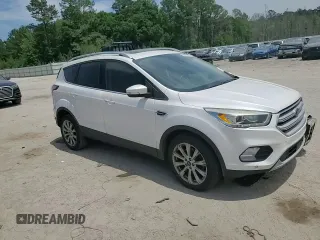 2018 Ford Escape Titanium with VIN 1FMCU0J99JUA06741, listed as a Copart auction lot 55782195 with 103,392 mi miles and Salvage title. Bid and sale history available at DreamBid. Image 15.