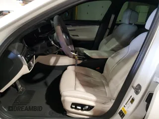2018 BMW 5 Series M550i xDrive with VIN WBAJB9C5XJB035514, listed as a Copart auction lot 50045425 with 76,325 mi miles and Salvage Title. Bid and sale history available at carsss.com. Image 7.
