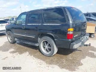 2004 Chevrolet Tahoe LT with VIN 1GNEC13Z74J323109, listed as a IAAI auction lot 41829422 with 261,636 mi miles. Bid and sale history available at carsss.com. Image 3.