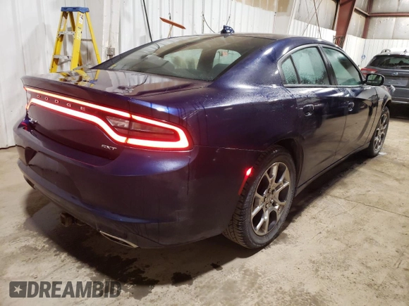 2015 Dodge Charger SXT z VIN 2C3CDXJG5FH810299, wystawiony jako Copart lot #55649945 z przebiegiem 135 864 mil mil oraz Szkoda całkowita • Salvage title. Historia ofert i sprzedaży dostępna na DreamBid. Obrazek 3.