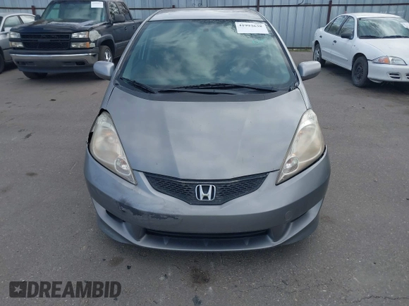 2009 Honda Fit Sport with VIN JHMGE884X9S045470, listed as a IAAI auction lot 41993638 with 181,198 mi miles. Bid and sale history available at carsss.com. Image 6.