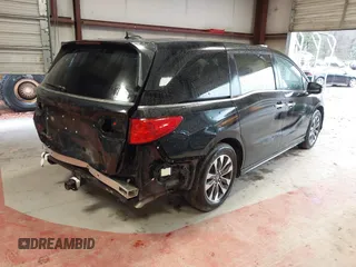 2024 Honda Odyssey EX-L with VIN 5FNRL6H65RB018633, listed as a IAAI auction lot 41801512 with 22,103 mi miles and . Bid and sale history available at DreamBid. Image 4.