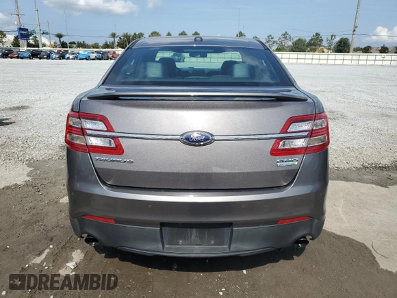 2014 Ford Taurus SHO with VIN 1FAHP2KT2EG152366, listed as a Copart auction lot 56479525 with 82,639 mi miles and Salvage title. Bid and sale history available at DreamBid. Image 6.
