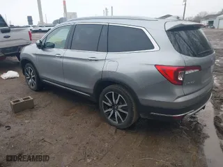 2019 Honda Pilot Touring 7-Passenger with VIN 5FNYF6H68KB050310, listed as a IAAI auction lot 41730210 with 100,245 mi miles. Bid and sale history available at carsss.com. Image 3.