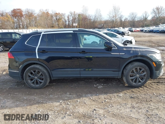 2022 Volkswagen Tiguan SE with VIN 3VV3B7AX8NM163352, listed as a IAAI auction lot 40946586 with 27,847 mi miles and . Bid and sale history available at DreamBid. Image 14.