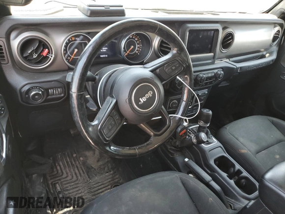 2020 Jeep Wrangler Sport with VIN 1C4GJXAGXLW237080, listed as a Copart auction lot 57769704 with 144,137 mi miles and Salvage title. Bid and sale history available at DreamBid. Image 8.