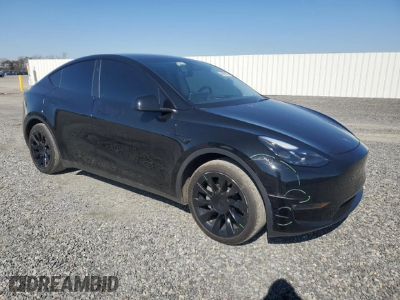 2023 Tesla Model Y Long Range with VIN 7SAYGDEE5PF892285, listed as a Copart auction lot 46458635 with 39,951 mi miles and Salvage Title. Bid and sale history available at DreamBid. Image 4.