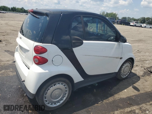 2015 Smart fortwo Passion with VIN WMEEJ3BA6FK819930, listed as a Copart auction lot 64722495 with 106,124 mi miles and Clean title. Bid and sale history available at DreamBid. Image 3.