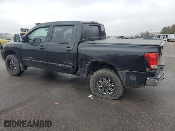 2014 Nissan Titan Pro-4X with VIN 1N6AA0EC3EN514744, listed as a Copart auction lot 80469314 with 191,780 mi miles and Salvage title. Bid and sale history available at DreamBid. Image 2.