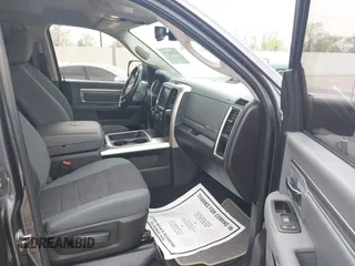 2018 Ram 1500 SLT z VIN 1C6RR7GM5JS308499, wystawiony jako IAAI lot #41904274 z przebiegiem 71 510 mil mil oraz . Historia ofert i sprzedaży dostępna na DreamBid. Obrazek 5.