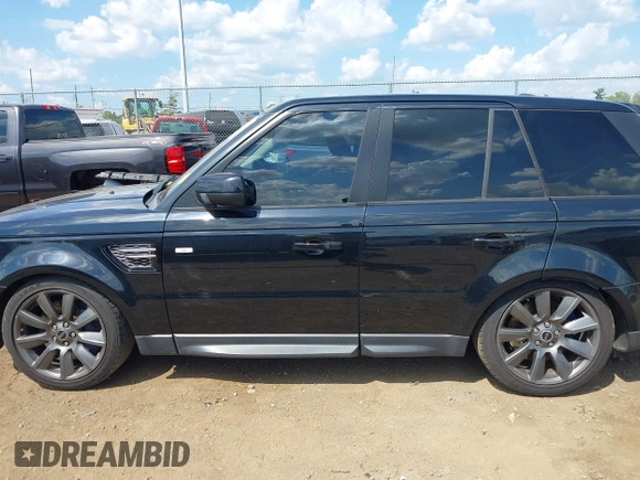 2012 Land Rover Range Rover Sport SC with VIN SALSH2E49CA720591, listed as a IAAI auction lot 40217754 with 122,643 mi miles. Bid and sale history available at carsss.com. Image 14.