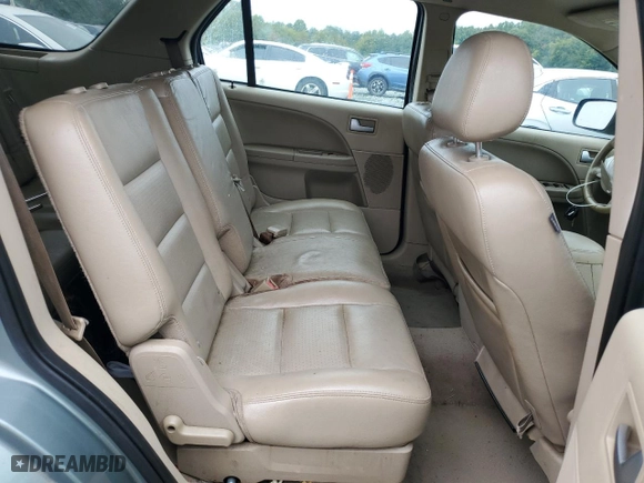 2006 Ford Freestyle Limited with VIN 1FMDK06136GA10335, listed as a Copart auction lot 72193264 with 218,418 mi miles and Salvage Title. Bid and sale history available at carsss.com. Image 11.