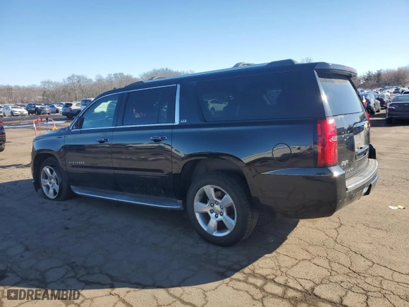2015 Chevrolet Suburban LTZ with VIN 1GNSKKKC8FR515538, listed as a Copart auction lot 46222145 with 132,347 mi miles and Salvage Title. Bid and sale history available at carsss.com. Image 2.