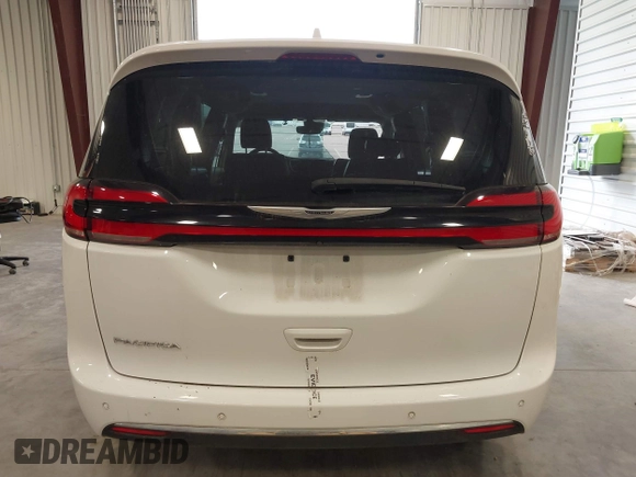 2022 Chrysler Pacifica Touring L with VIN 2C4RC1BGXNR144831, listed as a IAAI auction lot 40473026 with 36,495 mi miles and . Bid and sale history available at DreamBid. Image 16.
