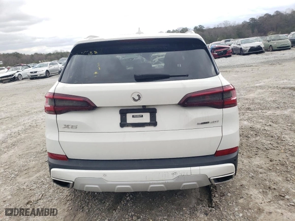 2021 BMW X5 sDrive40i with VIN 5UXCR4C02M9G19725, listed as a Copart auction lot 47860955 with 0 mi miles and Clean Title. Bid and sale history available at carsss.com. Image 6.