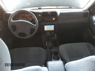 2002 Isuzu Rodeo S with VIN 4S2CK58WX24309147, listed as a Copart auction lot 44266155 with 73,935 mi miles and Salvage Title. Bid and sale history available at DreamBid. Image 8.