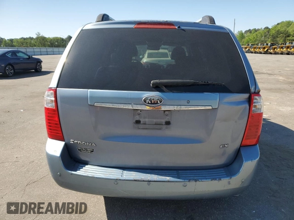 2008 Kia Sedona LX with VIN KNDMB233586210180, listed as a Copart auction lot 52090305 with 220,428 mi miles and Salvage Title. Bid and sale history available at carsss.com. Image 6.