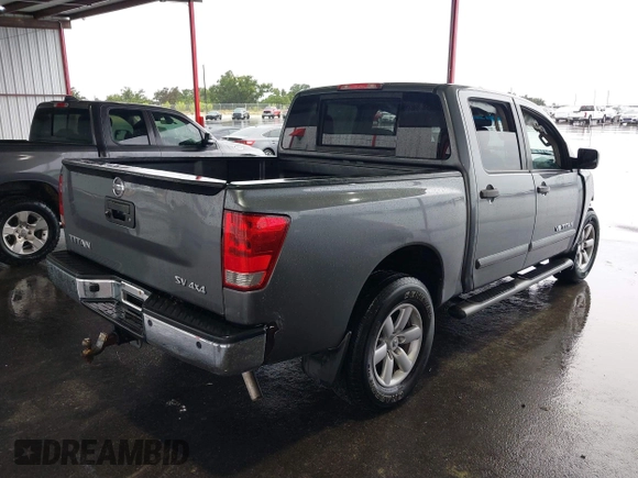 2014 Nissan Titan S with VIN 1N6AA0ECXEN504034, listed as a IAAI auction lot 39883492 with 189,529 mi miles and . Bid and sale history available at DreamBid. Image 4.