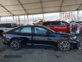 2024 Volkswagen Jetta Sport с VIN 3VWAM7BU2RM008822, выставлен на аукционе IAAI как лот 42258345 с пробегом 41 165 миль миль и . История ставок и продаж доступна на DreamBid. Изображение 14.