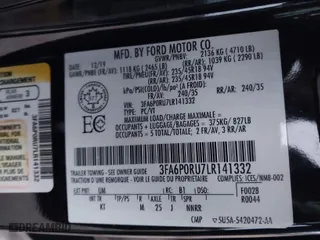 2020 Ford Fusion Hybrid Titanium with VIN 3FA6P0RU7LR141332, listed as a IAAI auction lot 40994365 with 106,592 mi miles. Bid and sale history available at carsss.com. Image 9.
