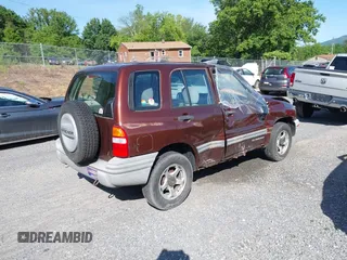2000 Chevrolet Tracker z VIN 2CNBJ13C3Y6917675, wystawiony jako IAAI lot #42281654 z przebiegiem 153 805 mil mil oraz . Historia ofert i sprzedaży dostępna na DreamBid. Obrazek 4.