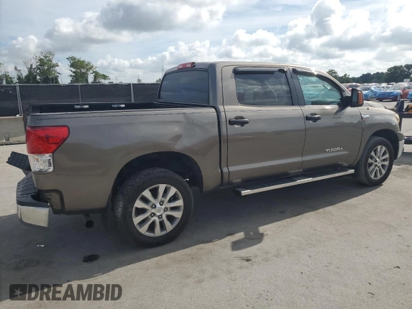 2012 Toyota Tundra z VIN 5TFDW5F14CX216264, wystawiony jako Copart lot #60983285 z przebiegiem 186 869 mil mil oraz Szkoda całkowita • Salvage title. Historia ofert i sprzedaży dostępna na DreamBid. Obrazek 3.