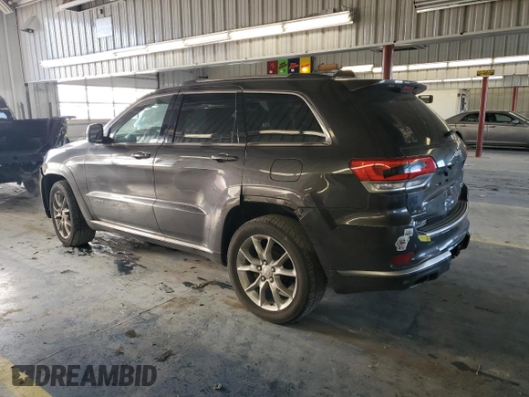 2015 Jeep Grand Cherokee Summit with VIN 1C4RJFJM9FC711776, listed as a Copart auction lot 84464454 with 94,637 mi miles and Salvage Title. Bid and sale history available at carsss.com. Image 2.