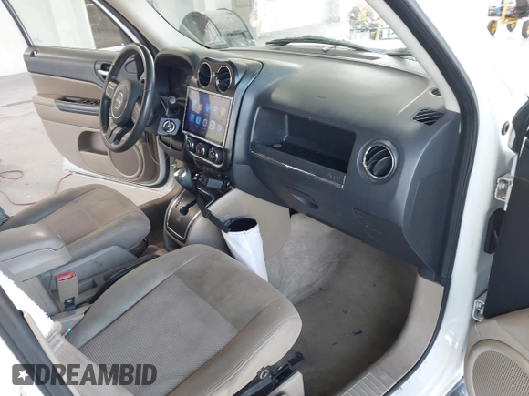 2014 Jeep Patriot High Altitude with VIN 1C4NJPFA1ED653402, listed as a IAAI auction lot 42371410 with 165,459 mi miles and . Bid and sale history available at DreamBid. Image 5.