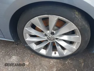 2013 Volkswagen CC Executive z VIN WVWGU7AN3DE524175, wystawiony jako IAAI lot #42401952 z przebiegiem 165 023 mil mil oraz . Historia ofert i sprzedaży dostępna na DreamBid. Obrazek 12.