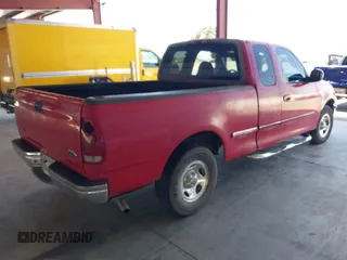 1998 Ford F-150 z VIN 1FTZX1720WNA51610, wystawiony jako IAAI lot #42527348 z przebiegiem 249 999 mil mil oraz . Historia ofert i sprzedaży dostępna na DreamBid. Obrazek 4.