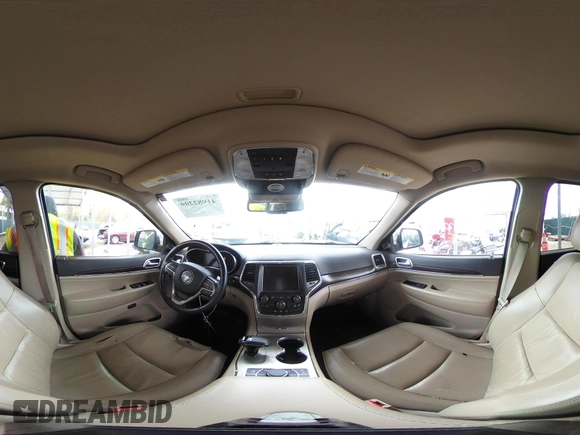 2014 Jeep Grand Cherokee Limited with VIN 1C4RJFBG4EC347208, listed as a IAAI auction lot 41982209 with 124,663 mi miles and . Bid and sale history available at DreamBid. Image 19.