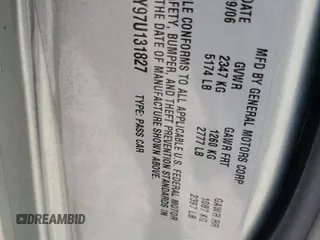 2007 Cadillac DTS Luxury I z VIN 1G6KD57Y97U131827, wystawiony jako Copart lot #47862515 z przebiegiem 103 713 mil mil oraz Szkoda całkowita • Salvage title. Historia ofert i sprzedaży dostępna na DreamBid. Obrazek 14.