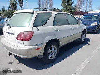 1999 Lexus RX 300 Luxury SUV with VIN JT6HF10U0X0092593, listed as a IAAI auction lot 41974376 with 111,003 mi miles. Bid and sale history available at carsss.com. Image 4.